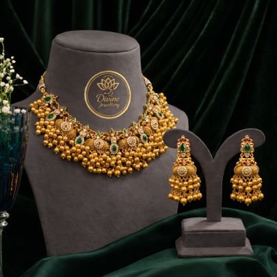 Antique Gold Beaded Temple Choker Necklace Set with Green Stones & Jhumka Earrings – 92.5 Silver Gold Plated