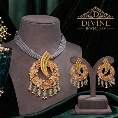 Contemporary Leaf Motif Statement Pendant Necklace Set with Aqua Drops in 92.5 Silver Gold Plated | Divine Jewellery