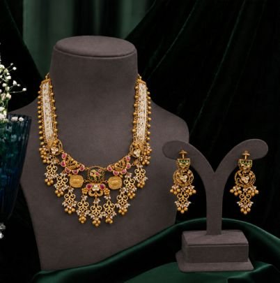 Divine Jewellery Antique Gold-Plated Traditional Temple Jewelry Set with Pearl Strands, Ruby Accents, and Detailed Floral Craftsmanship