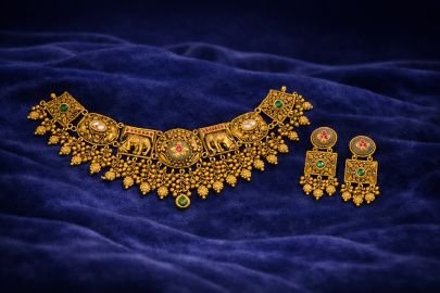 Divine Jewellery Antique Temple Elephant Choker Necklace Set with Heritage Motifs and Green Stone Accents