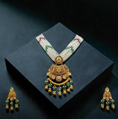 Exclusive White Moti Mala With Green Pendant Necklace