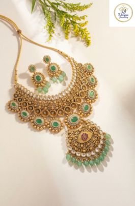 Royal Emerald Kundan Bridal Necklace with Grand Pendant & Antique Gold Finish in 92.5 Silver
